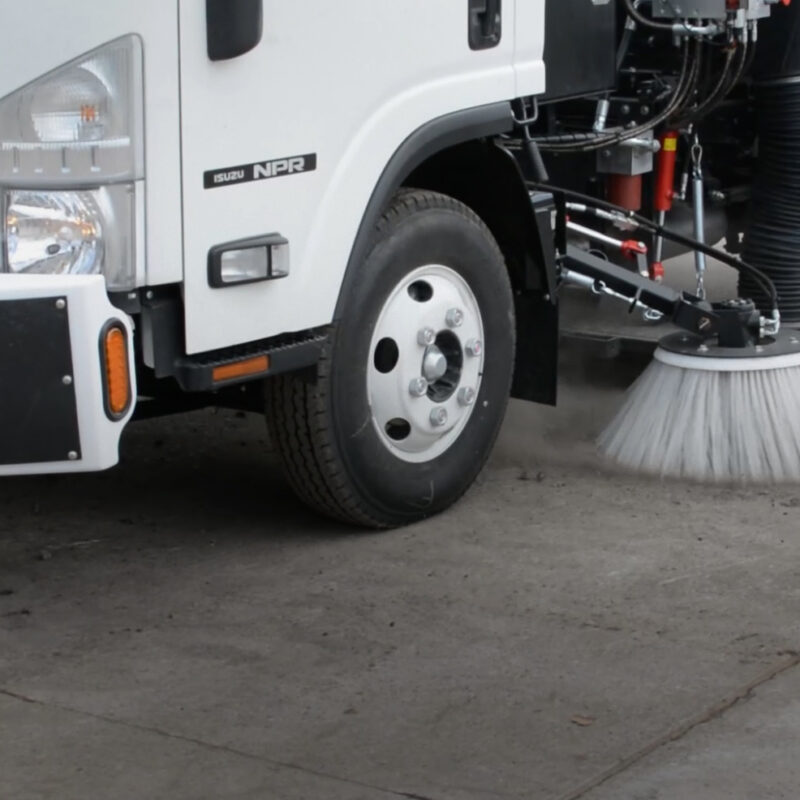 Sweeping with a street sweeper truck
